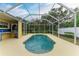 Inviting screened pool with a large patio at 7023 Chickasaw Bayou Rd, Bradenton, FL 34203