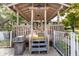Charming community gazebo with picnic tables and lush surroundings at 752 White Pine Tree Rd # 108, Venice, FL 34285