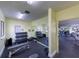 Weight room featuring racks of dumbbells and a mirror for form, promoting a healthy lifestyle at 752 White Pine Tree Rd # 108, Venice, FL 34285