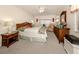 Spacious bedroom with a king-size bed and ample closet space at 806 Capri Isles Blvd # 109, Venice, FL 34292