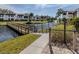 Wooden walkway offering scenic waterfront views at 806 Capri Isles Blvd # 109, Venice, FL 34292