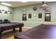 Well-equipped billiards room with two pool tables at 808 S Green Cir, Venice, FL 34285