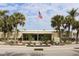 Community center with landscaping and American flag at 808 S Green Cir, Venice, FL 34285
