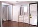 Laundry room with washer, dryer, and built-in storage at 808 S Green Cir, Venice, FL 34285