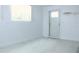 Empty storage room with white walls and door at 808 S Green Cir, Venice, FL 34285