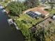 Waterfront home with private pool and dock, perfect for boaters at 809 Garland Ave, Nokomis, FL 34275