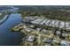 Spacious waterfront home with lush landscaping and canal views at 809 Garland Ave, Nokomis, FL 34275