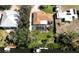 Aerial view showcasing a home's pool, canal views, and boat dock at 809 Garland Ave, Nokomis, FL 34275