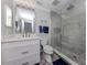 Updated bathroom with a large walk-in shower and modern vanity at 809 Garland Ave, Nokomis, FL 34275