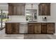 Updated kitchen featuring stainless steel appliances and ample counter space at 809 Garland Ave, Nokomis, FL 34275
