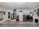 Bright laundry room with washer, dryer, and ample storage at 809 Garland Ave, Nokomis, FL 34275