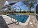 Enjoy this refreshing pool with screened enclosure at 809 Garland Ave, Nokomis, FL 34275