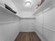 Spacious closet with wood flooring and shelving at 854 Senda Plata # 22, Venice, FL 34293