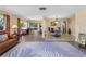Open concept living and dining area with hardwood floors and a view into the kitchen at 854 Senda Plata # 22, Venice, FL 34293