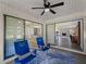 Screened porch with view into the living room and kitchen at 854 Senda Plata # 22, Venice, FL 34293