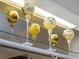 Glass shelving displays decorative candle holders at 854 Senda Plata # 22, Venice, FL 34293