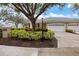 Two-car garage home with mature landscaping at 900 Paisley Ct # 1, Venice, FL 34293
