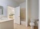 Clean bathroom with tub shower combo, toilet and vanity at 901 Triano Cir # 901, Venice, FL 34292