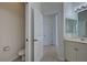 Guest bathroom with toilet and vanity at 901 Triano Cir # 901, Venice, FL 34292
