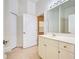 Bathroom with vanity and access to other rooms at 901 Triano Cir # 901, Venice, FL 34292