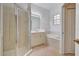 Bathroom boasts a shower, bathtub, and vanity at 901 Triano Cir # 901, Venice, FL 34292