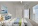 Bedroom with double doors leading to closet and bath at 901 Triano Cir # 901, Venice, FL 34292
