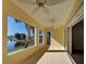 Enclosed patio with golf course and lake view at 901 Triano Cir # 901, Venice, FL 34292