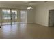 Spacious living area with access to a relaxing patio at 901 Triano Cir # 901, Venice, FL 34292