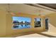 Sunroom features water views and ceiling fans at 901 Triano Cir # 901, Venice, FL 34292