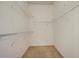 Large walk-in closet with wire shelving at 901 Triano Cir # 901, Venice, FL 34292