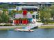 Community boat dock with kayaks and paddleboards at 1014 Tuscany Blvd, Venice, FL 34292