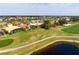 Property view showcasing neighborhood and golf course at 1018 Grouse Way, Venice, FL 34285