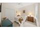 Cozy bedroom with a double bed and plenty of closet space at 11204 Mcdermott Ct # 11204, Englewood, FL 34223