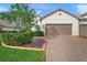 Beautiful home exterior with landscaped yard at 11204 Mcdermott Ct # 11204, Englewood, FL 34223