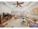 Spacious living room with open floor plan and kitchen views at 11204 Mcdermott Ct # 11204, Englewood, FL 34223