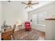 Home office with built-in desk and comfortable seating at 11204 Mcdermott Ct # 11204, Englewood, FL 34223