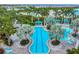 Resort-style pool with lap lanes, cabanas, and lounge chairs at 11204 Mcdermott Ct # 11204, Englewood, FL 34223