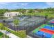 Tennis and pickleball courts with surrounding fencing at 11204 Mcdermott Ct # 11204, Englewood, FL 34223