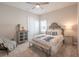 Cozy bedroom with a comfortable bed and plenty of natural light at 11571 Gleaming Ter, Venice, FL 34293