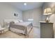 Comfortable bedroom with neutral tones, soft carpet, and a serene ambiance at 11842 Sistine Ln, Venice, FL 34293