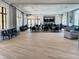 Community clubhouse with ample seating, tables, and stylish decor for social gatherings at 11842 Sistine Ln, Venice, FL 34293