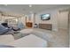 Open floor plan showcasing a living room connected to the dining and kitchen areas at 11842 Sistine Ln, Venice, FL 34293