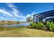 Expansive view of the lake and surrounding properties from the back yard at 11842 Sistine Ln, Venice, FL 34293