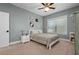 Bright bedroom with a full-size bed and large window at 1218 Mcgregor St, Punta Gorda, FL 33950