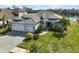 Single-Gathering home with three car garage and lake view at 12353 Auburndale Ct, Venice, FL 34293