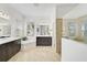 Spa-like bathroom with double vanity and large shower at 12353 Auburndale Ct, Venice, FL 34293