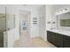 Bathroom with double vanity and a large shower at 12353 Auburndale Ct, Venice, FL 34293
