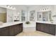 Bathroom with double vanity, soaking tub, and walk in shower at 12353 Auburndale Ct, Venice, FL 34293
