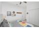 Bright bedroom with a queen-size bed and plenty of natural light at 12353 Auburndale Ct, Venice, FL 34293