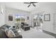 Spacious living area with sliding doors leading to a screened patio at 12353 Auburndale Ct, Venice, FL 34293